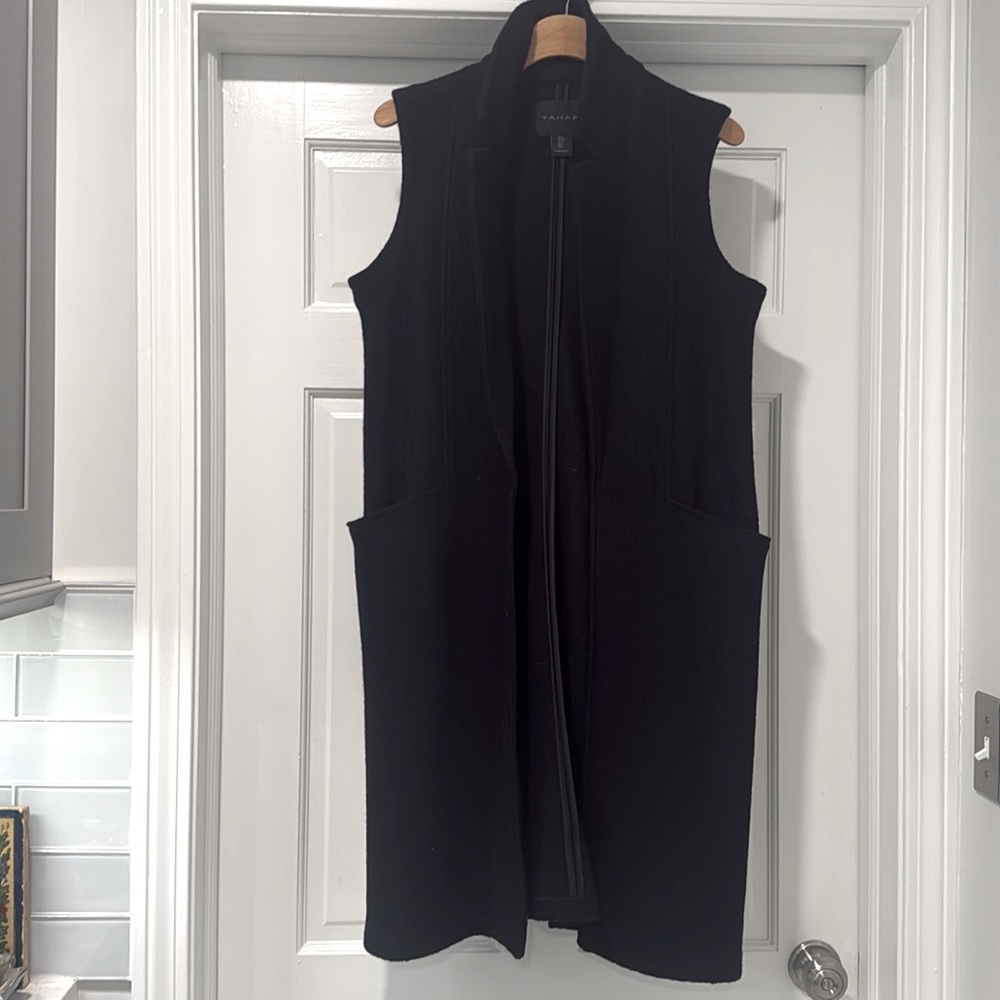 Black TAHARI long sweater vest nice collar and side pockets.